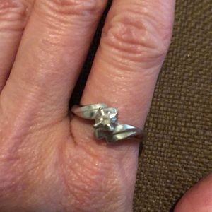 Silver ring with small stone